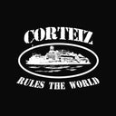 Grunge-style Corteiz logo with bold text, oval frame, and island graphic in black and white.
