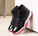 Black and red streetwear sneakers with patent leather detail and white sole, stylish footwear