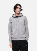Person wearing a grey hoodie with 'dropout' logo on a white background