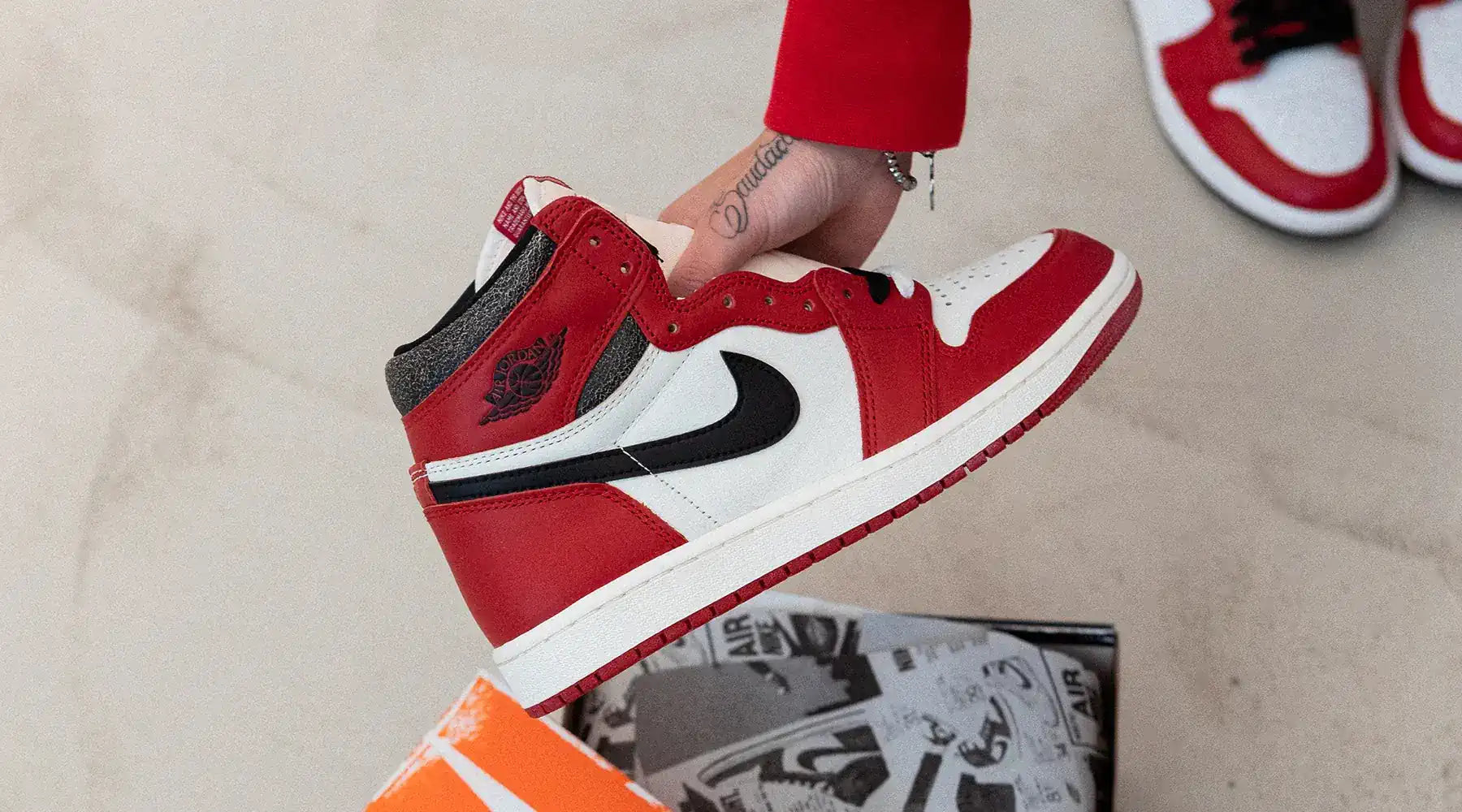 person holding a Jordan 1 