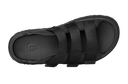 Black sandal with UGG logo on a light gray background
