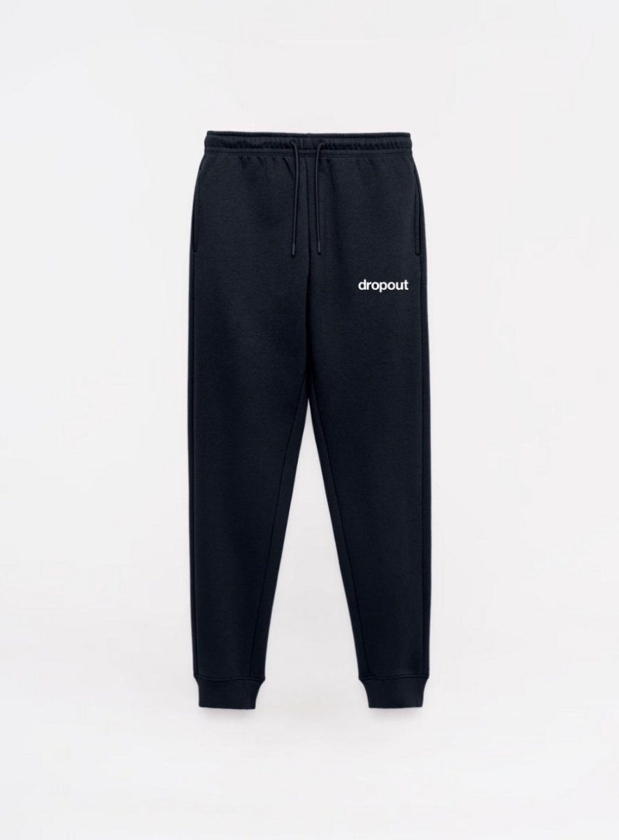 Black sweatpants with 'dropout' logo on a white background