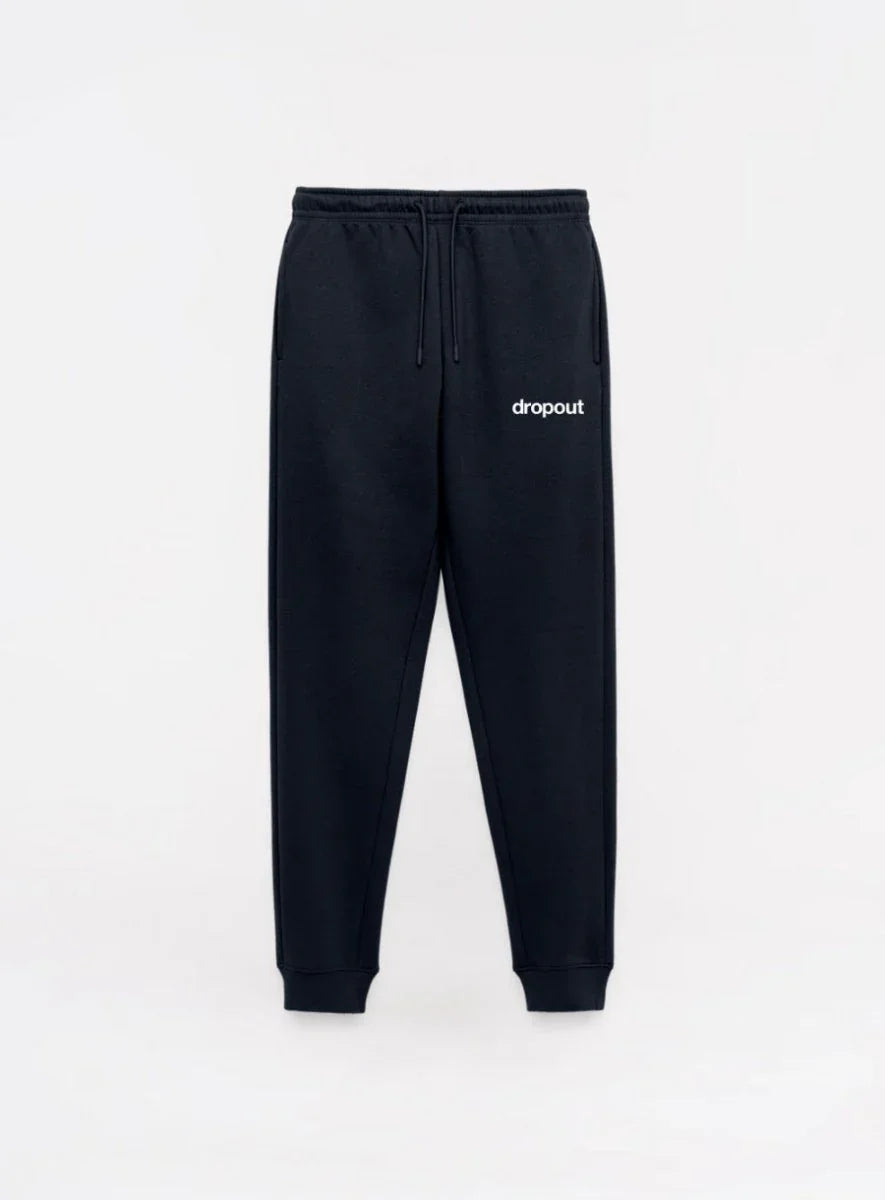 Black sweatpants with 'dropout' logo on a white background