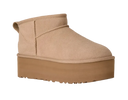 Beige platform boot on a white background