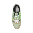 Top view of a green and beige mesh sneaker with white laces and black details
