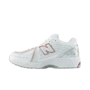 White mesh sneaker with red and silver accents, low-top athletic shoe, side view