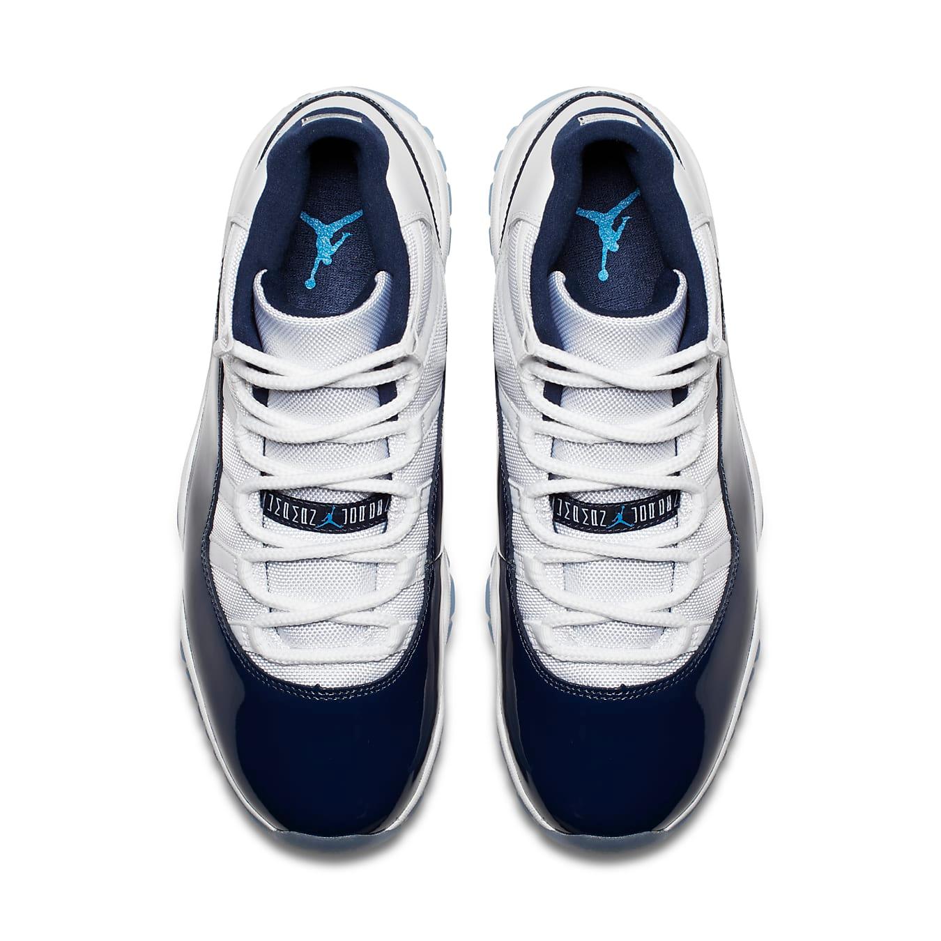 Top view of Air Jordan 11 Retro UNC Win Like 82 sneakers featuring navy and white colorway.