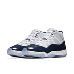 Air Jordan 11 Retro UNC 'Win Like 82' sneakers in white and navy colorway.