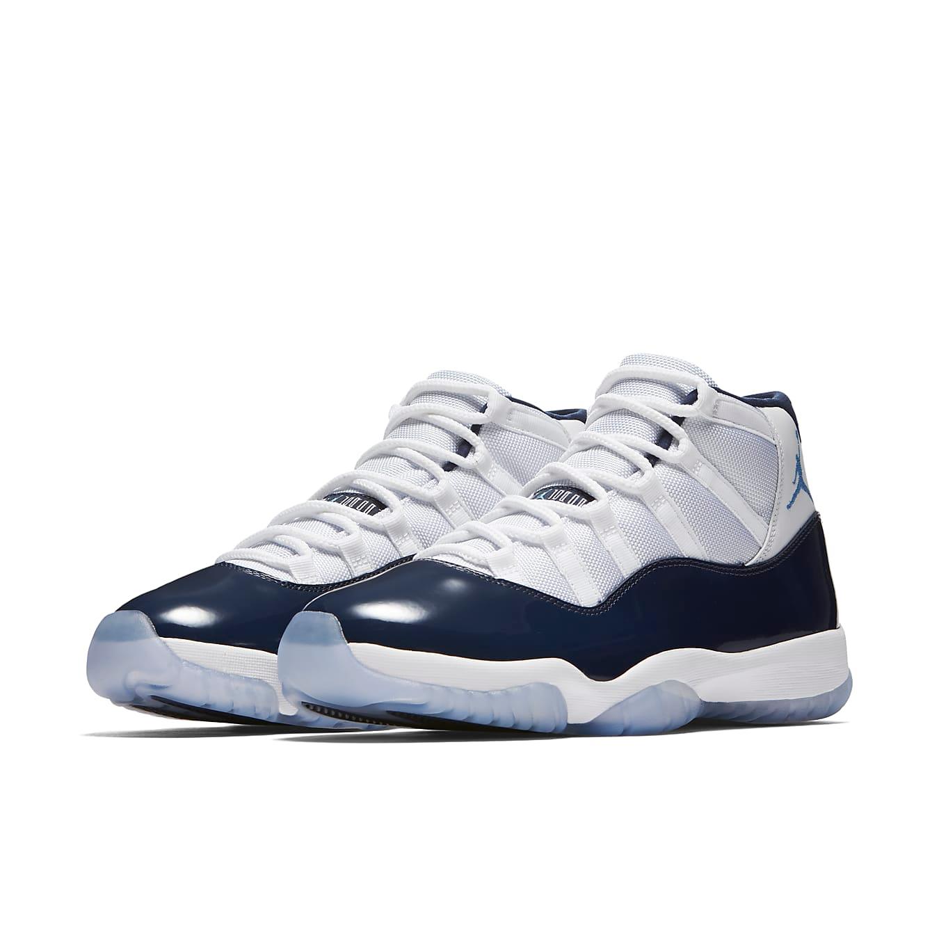 Air Jordan 11 Retro UNC 'Win Like 82' sneakers in white and navy colorway.