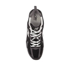 Black and white New Balance running sneaker top view, mesh panels, streetwear shoe