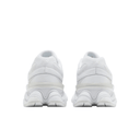 Rear view of white mesh and leather chunky sneakers with thick textured soles