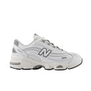 White sneaker with gray accents on a white background