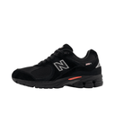 Black New Balance 2002R sneaker with suede and mesh, low-top streetwear shoe