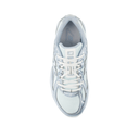 Top view of a white and light blue New Balance sneaker with mesh and lace-up design