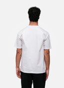 Person wearing a plain white t-shirt on a white background