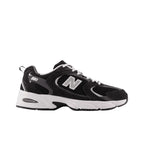 Black and white New Balance sneaker with mesh and suede, ideal for streetwear style