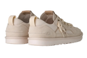 Pair of beige sneakers on a white background