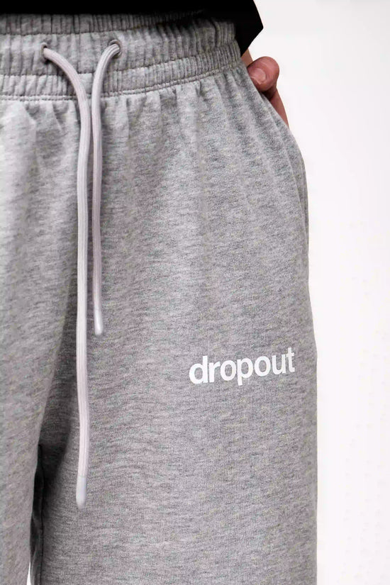 grey sweatpants with 'dropout' text on a white background