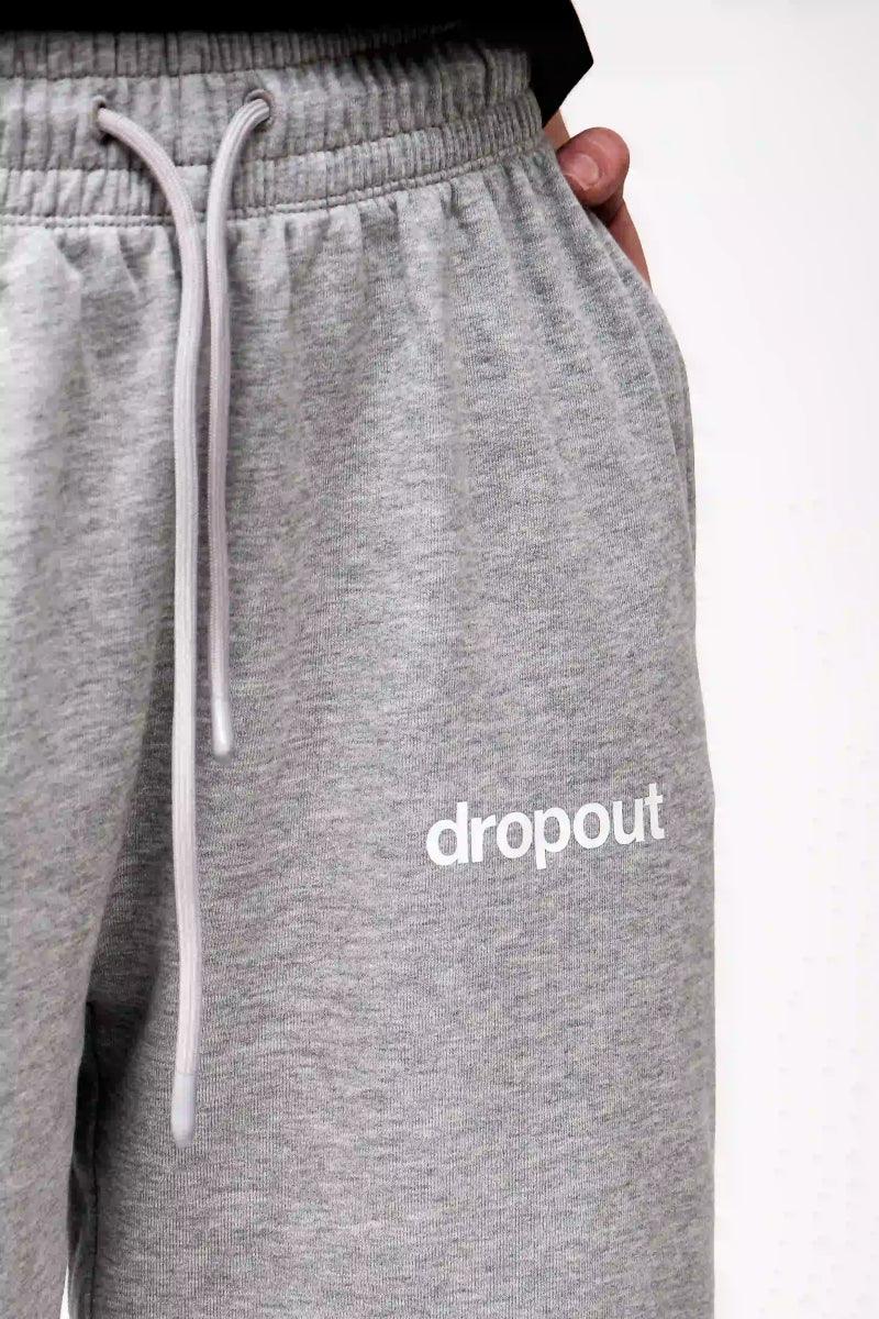 grey sweatpants with 'dropout' text on a white background