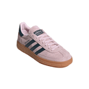 Pink Adidas sneaker with brown sole on a white background