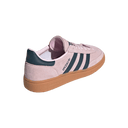 Pink Adidas sneaker with brown sole on a light gray background