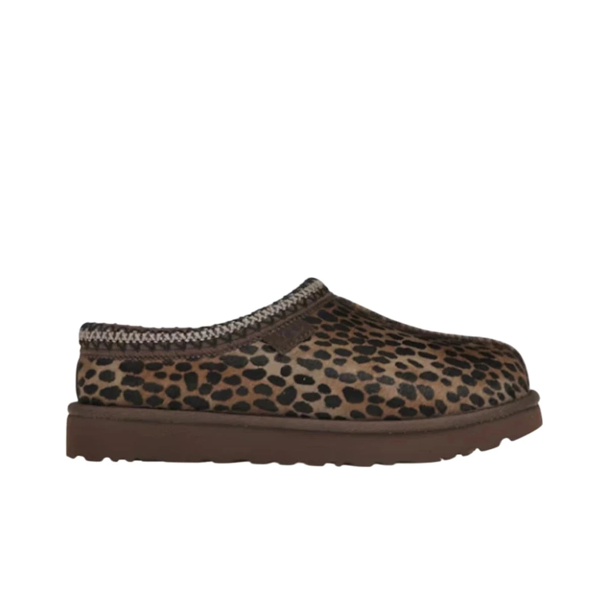 Women's leopard print slipper with brown sole and decorative trim, side profile view