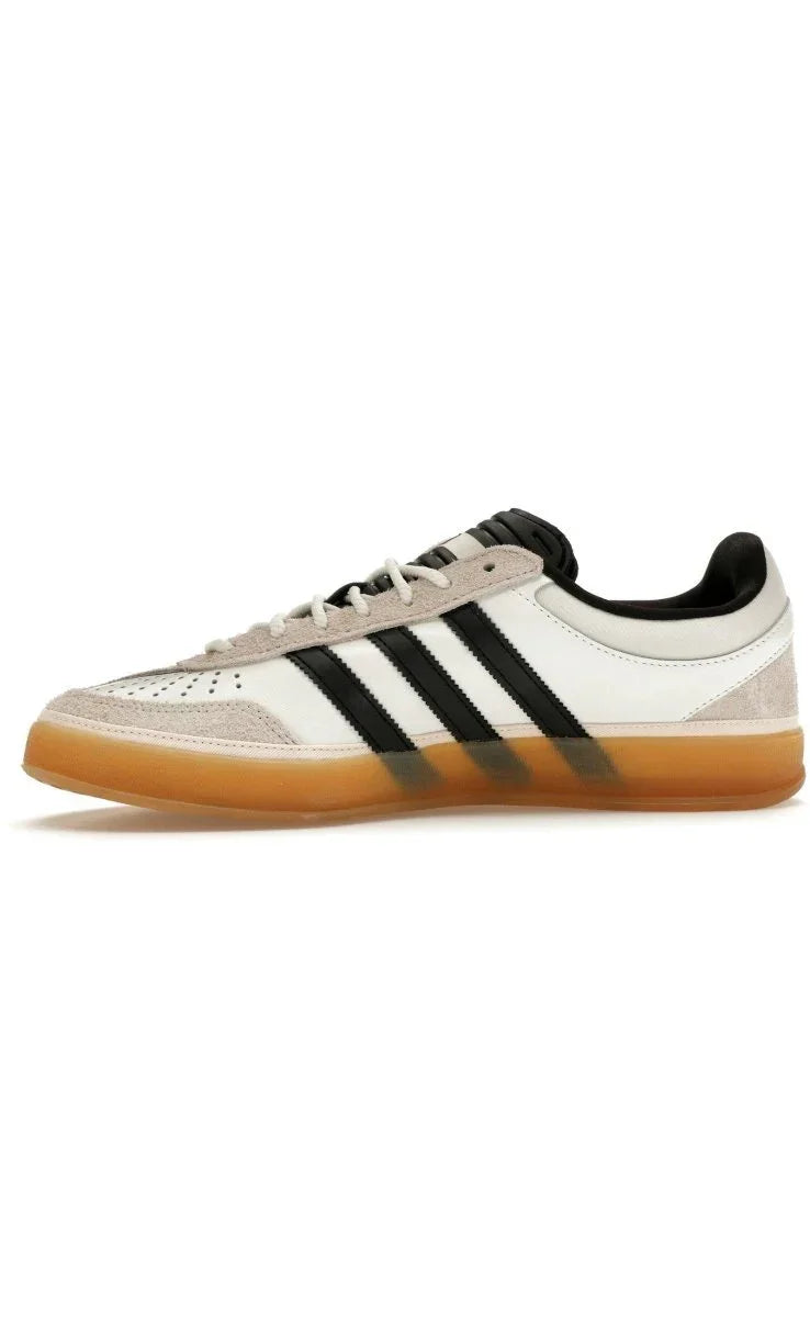 adidas Gazelle Indoor Bad Bunny in Core White with black stripes and gum sole, stylish leather and suede design.