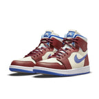 Air Jordan 1 High Zoom CMFT Team Red sneaker featuring red, white, and blue colorway with Nike Swoosh.