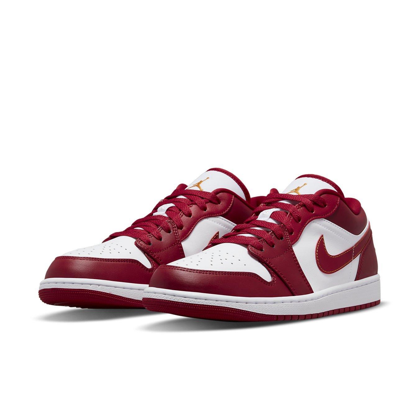 Air Jordan 1 Low Cardinal Red sneakers featuring red and white leather with a vibrant orange logo.