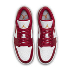 Air Jordan 1 Low Cardinal Red sneakers with white and red color blocks, featuring orange stitching and Jumpman logo.