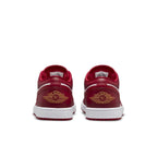 Retro Air Jordan 1 Low Cardinal Red sneaker rear view with iconic Wings logo and clean white sole.