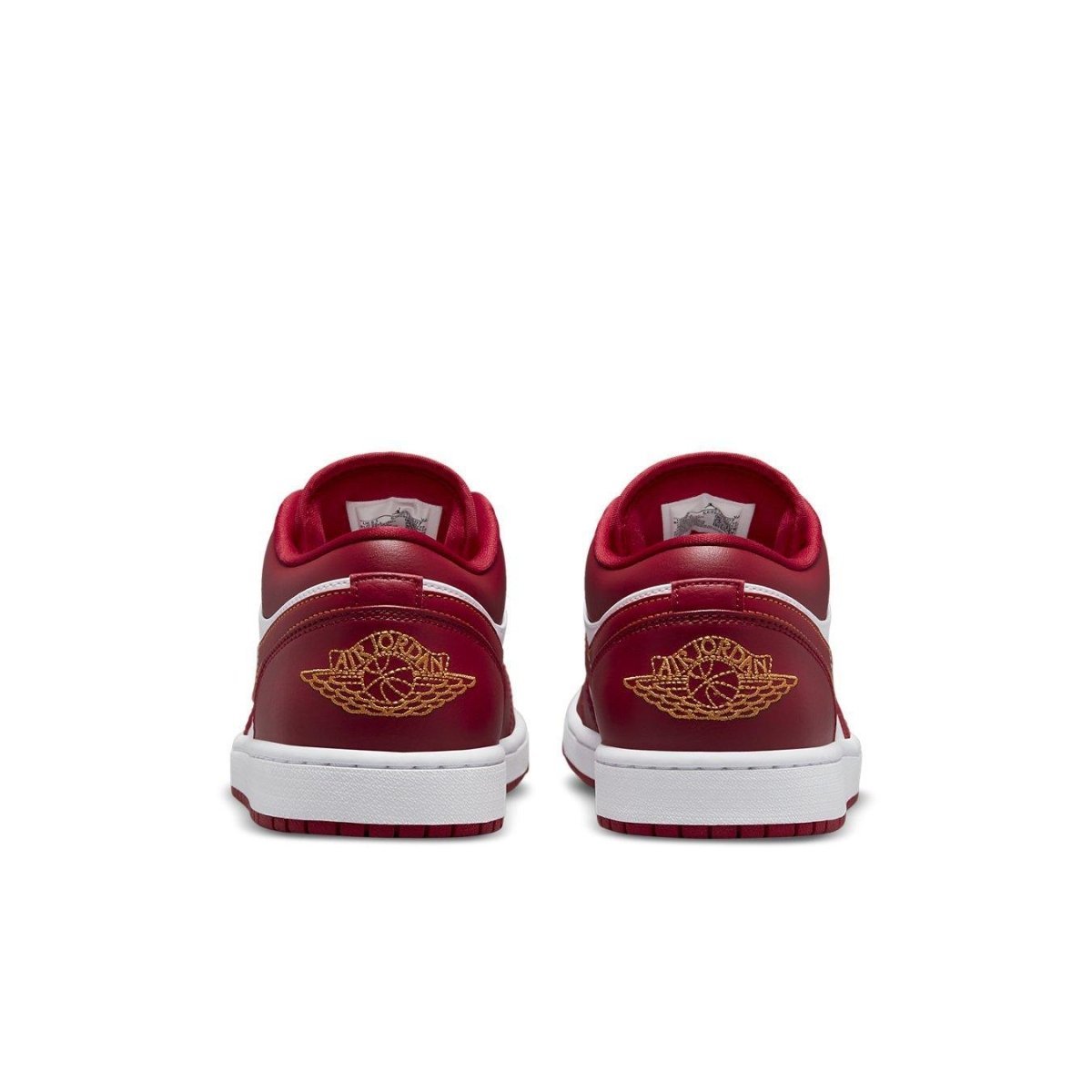Retro Air Jordan 1 Low Cardinal Red sneaker rear view with iconic Wings logo and clean white sole.