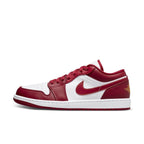 Air Jordan 1 Low Cardinal Red sneaker featuring white leather and red overlays, showcasing the signature wings emblem.