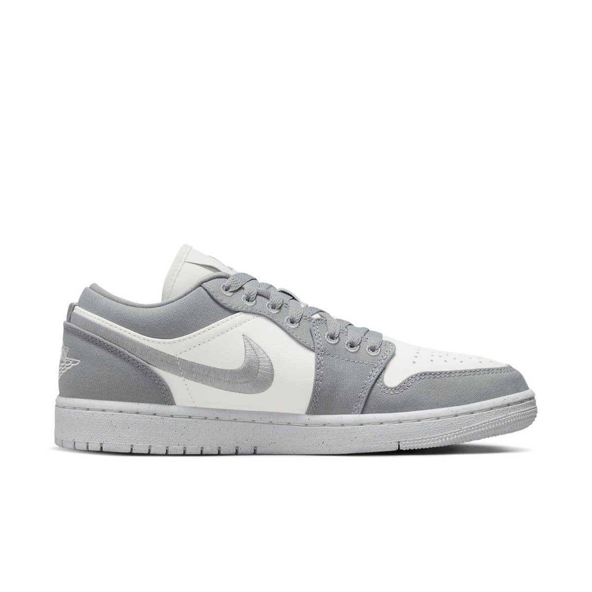 Air Jordan 1 Low SE Light Steel Grey women's sneakers in a mix of grey and white shades.