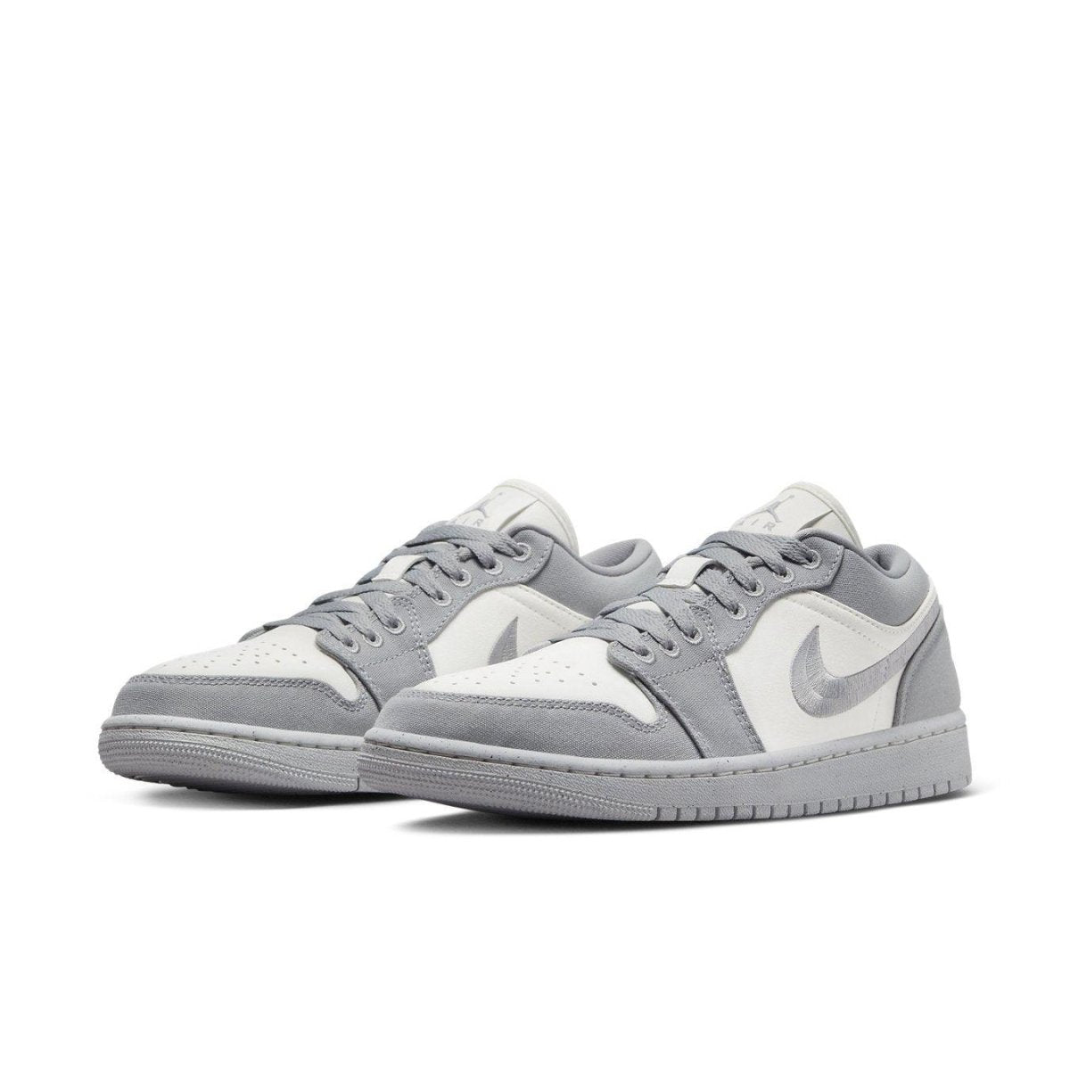 Jordan 1 Low SE Light Steel Grey women's sneakers in grey and white, featuring breathable design and comfortable cushioning.