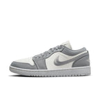 Jordan 1 Low SE Light Steel Grey sneakers for women in light grey and white with retro design and Air cushioning.