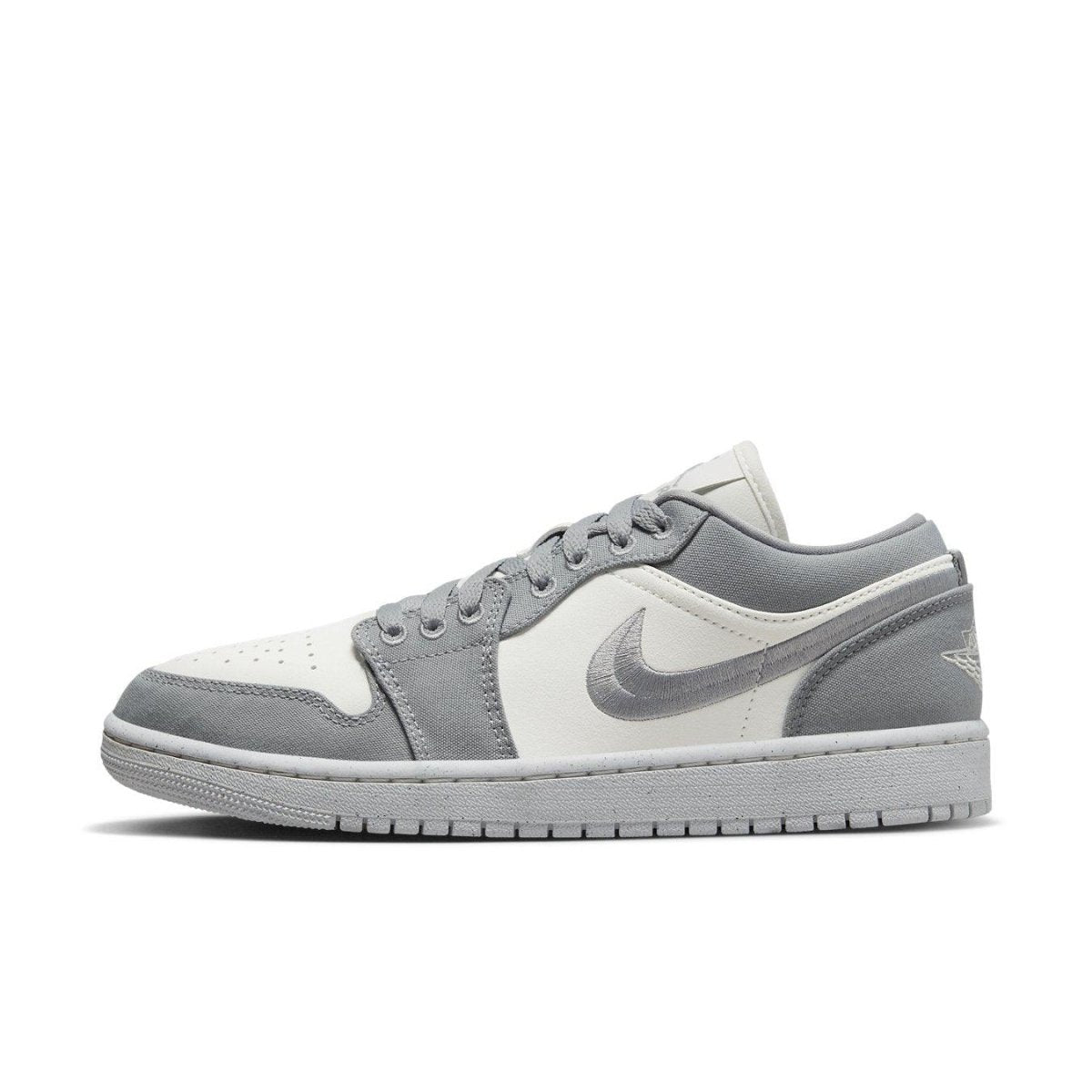 Jordan 1 Low SE Light Steel Grey sneakers for women in light grey and white with retro design and Air cushioning.