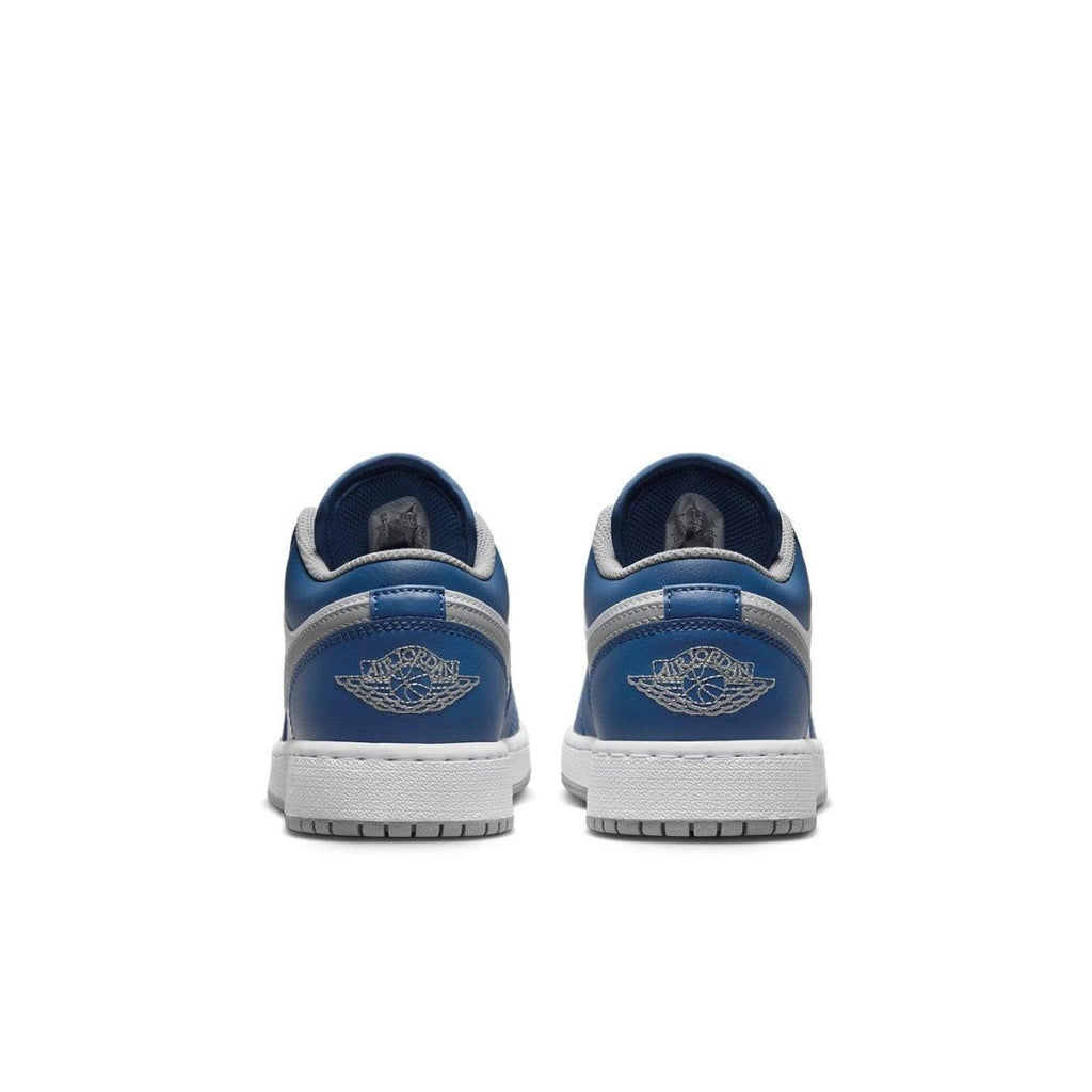 Back view of the Jordan 1 Low True Blue (GS) showcasing blue leather and white accents with classic branding.