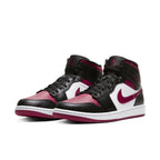 Air Jordan 1 Mid Bred Toe sneakers featuring black leather, Noble Red details, and white accents on the quarter panel.