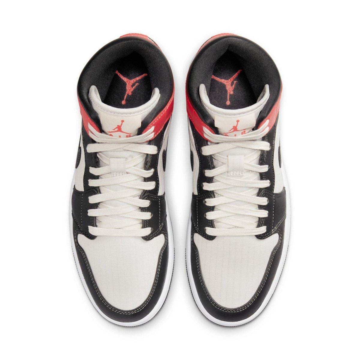 Air Jordan 1 Mid Light Orewood Brown women's sneakers with a sleek design and vibrant accents.