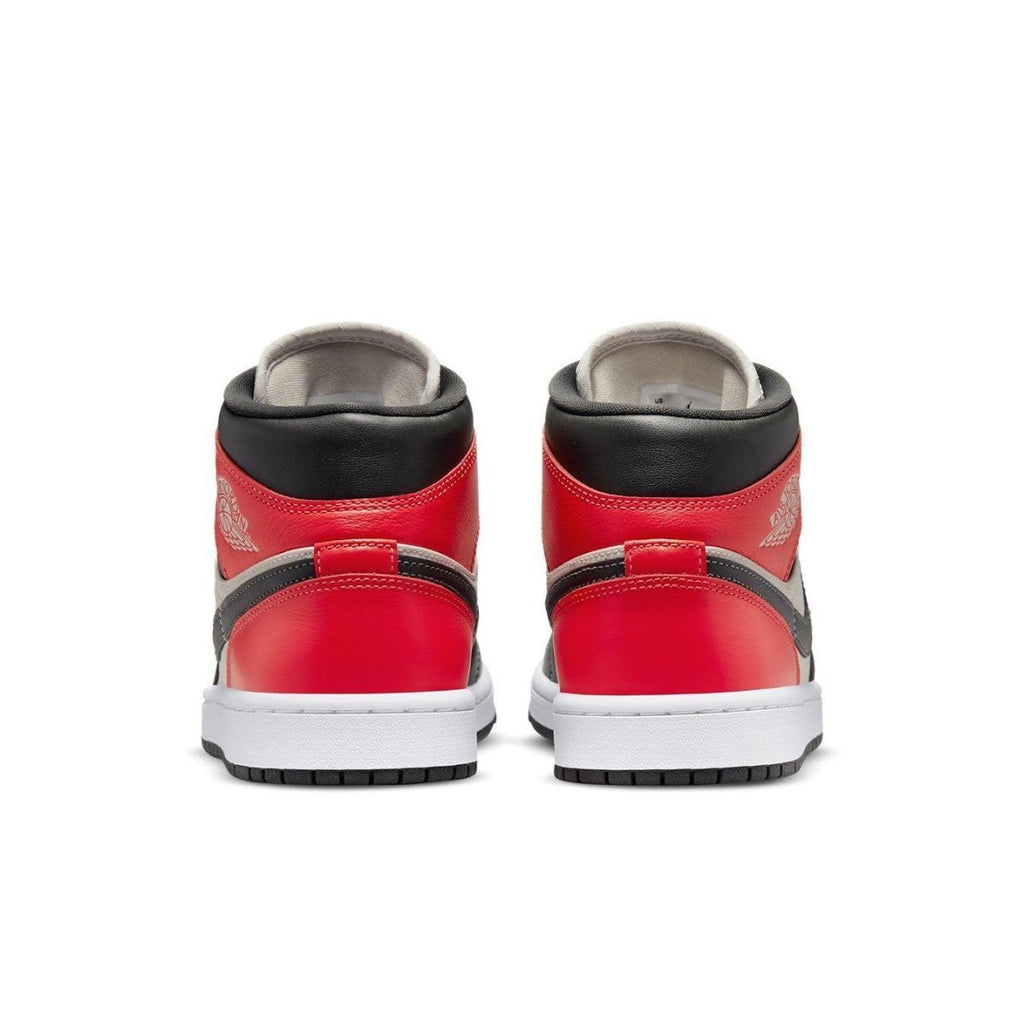 Jordan 1 Mid Light Orewood Brown women's sneaker back view with red and black accents.