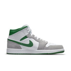 Jordan 1 Mid SE in grey and green with premium suede and leather upper, featuring Nike Swoosh and Air cushioning.