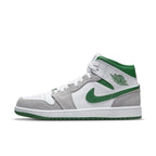 Jordan 1 Mid SE in grey and green, featuring premium suede upper and breathable perforations for comfort.