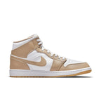 Air Jordan 1 Mid Tan Gum sneakers with white and tan leather design, featuring a gum outsole and classic silhouette.