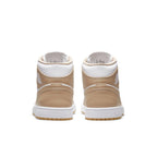 Jordan 1 Mid Tan Gum sneakers showcasing a premium tan and white design with a gum sole from the back view.