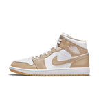 Jordan 1 Mid Tan Gum sneaker featuring white and tan leather design with gum sole and iconic wings logo.
