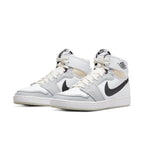 Jordan 1 Retro AJKO sneakers in white, black, and grey fog with Nike branding and cushioned sole for style and comfort.