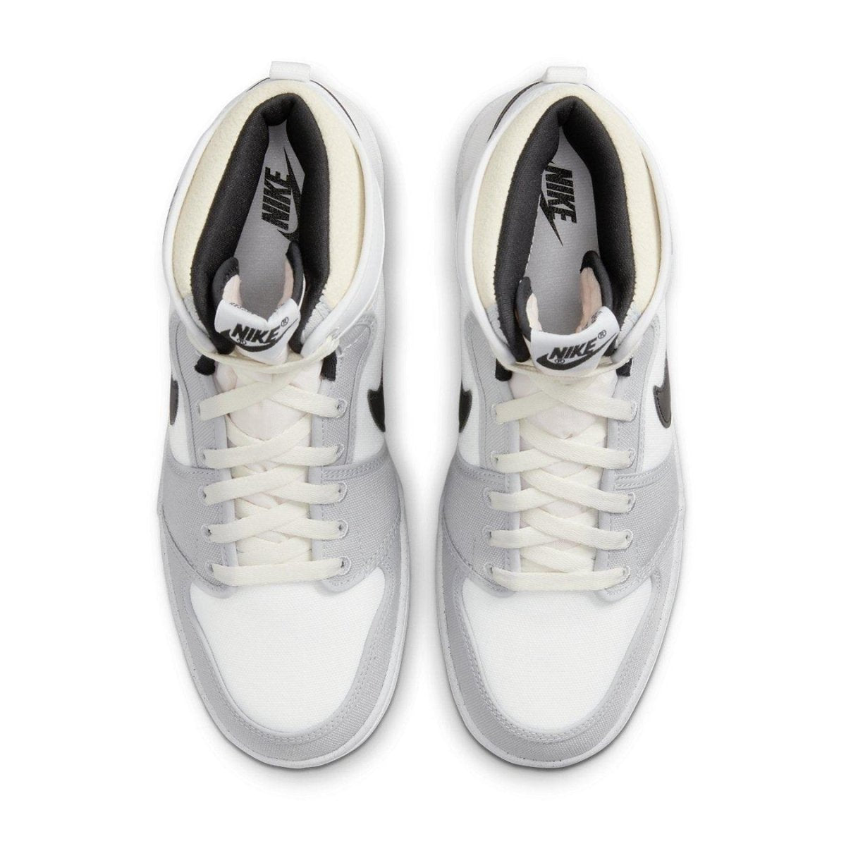 Nike Jordan 1 Retro AJKO in white, black, and grey fog with breathable canvas upper and signature Swoosh design.