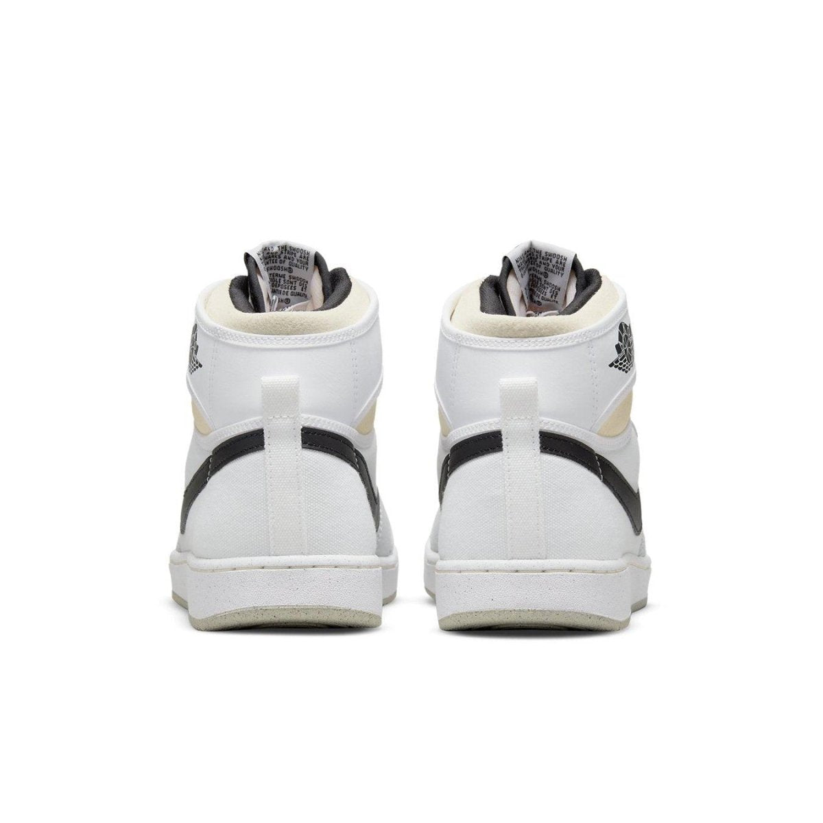 Rear view of Jordan 1 Retro AJKO sneakers in white, black, and grey fog with padded collar and logo details.