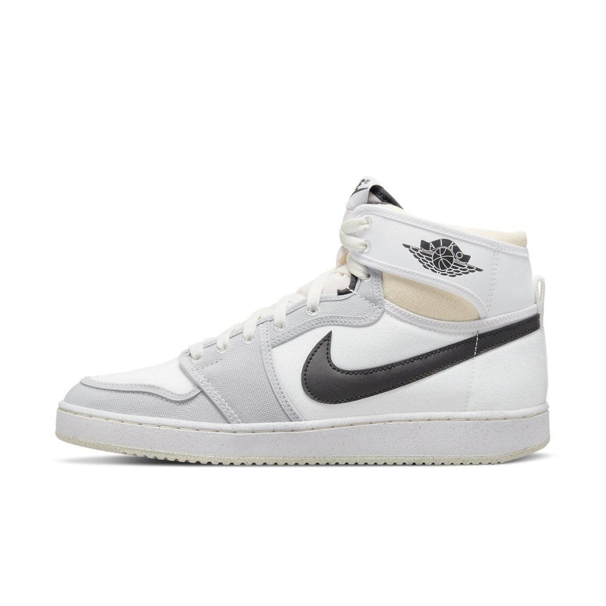 Jordan 1 Retro AJKO in white, black, and grey fog with breathable canvas upper and Nike Air cushioning.